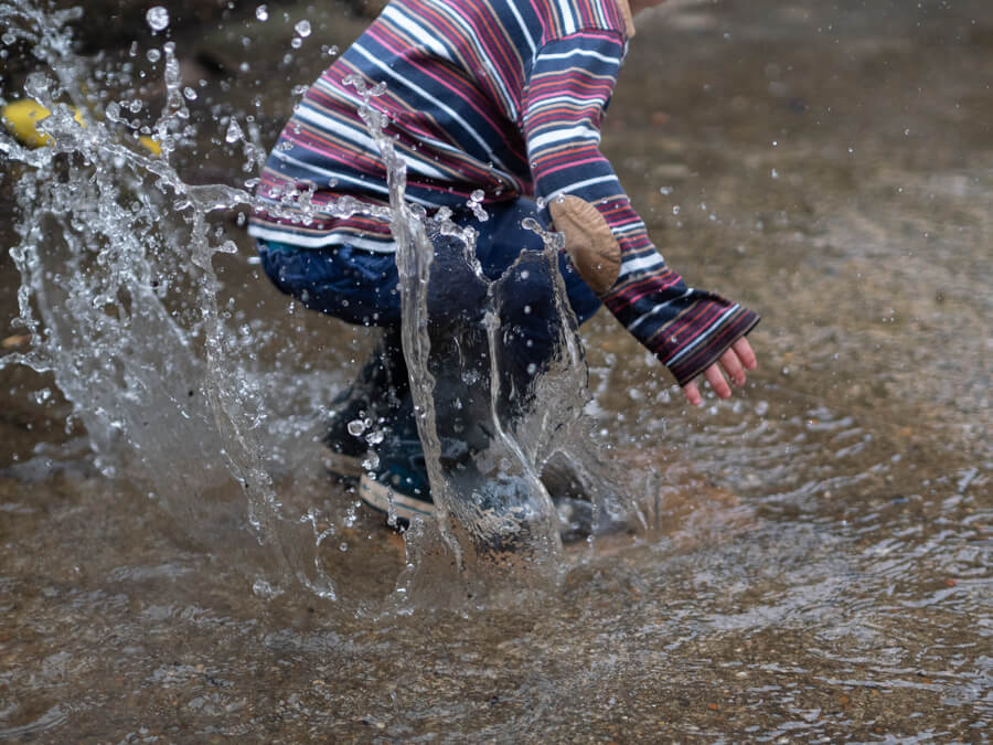 sketch of children playing in rain